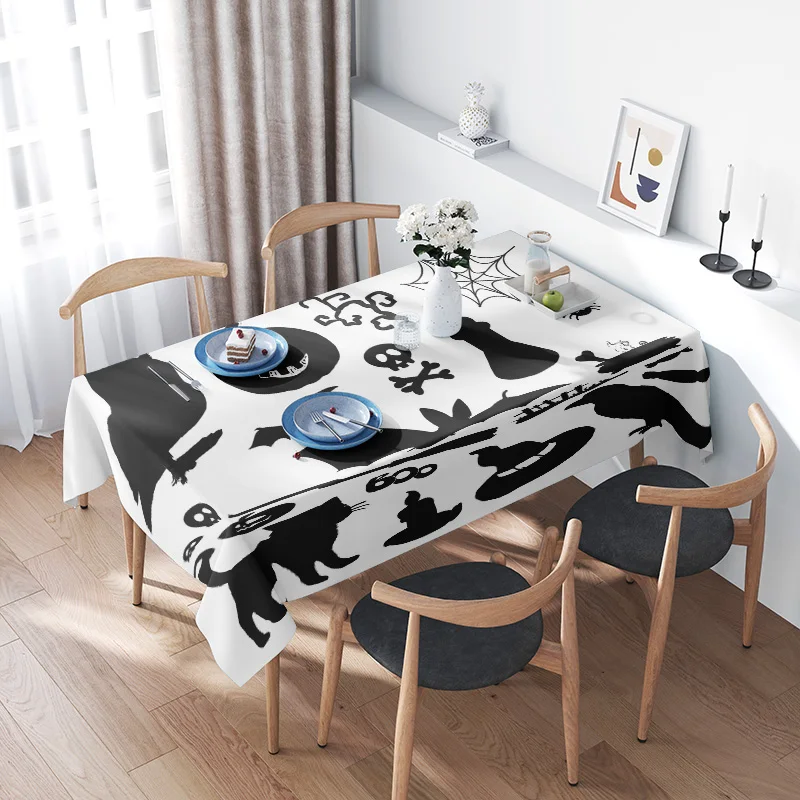

Halloween-themed tablecloth with black and white animal designs for home decoration during holiday seasons