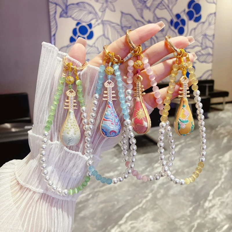

Ancient-style mobile phone chain, Song brocade accessory, exquisite beaded Pipa pendant, high-end Chinese fashion phone chain