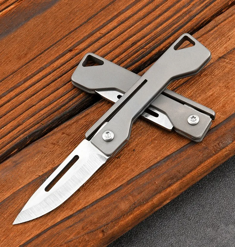 

Titanium alloy mini folding knife high hardness D2 steel sharp knife carry keychain pendant unpacking courier open box knife