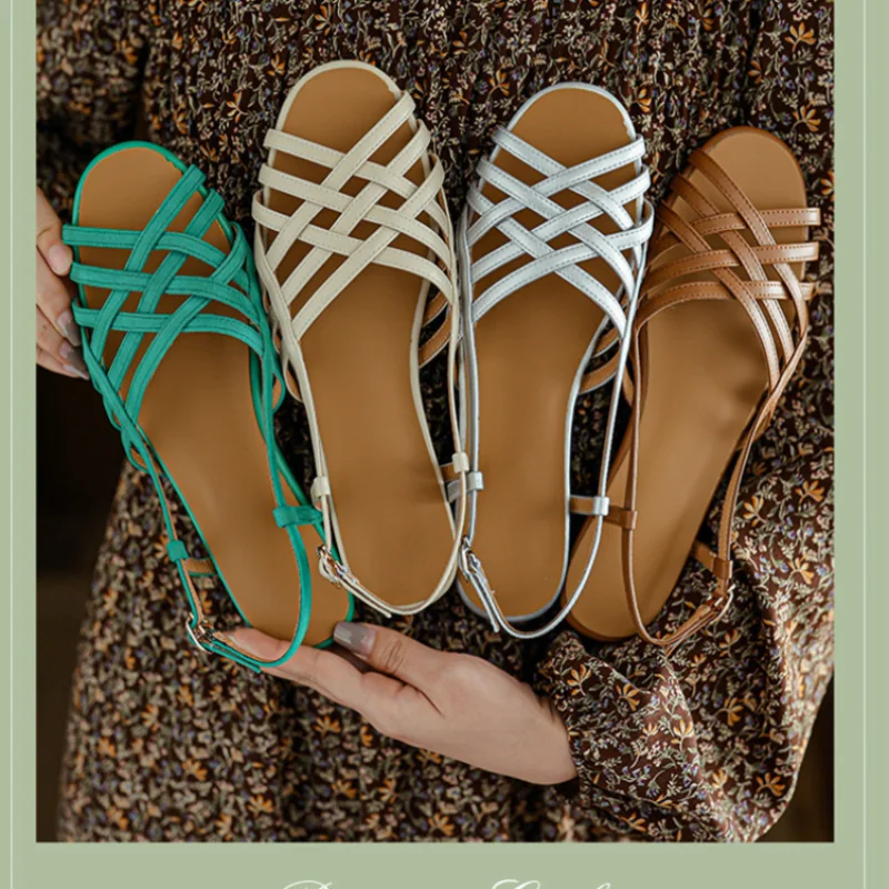 Letnie skórzane rzymskie tkane sandały damskie płaska podeszwa miękkie dno Casual Retro na niskim obcasie Hollow buty z odkrytymi noskami obuwie