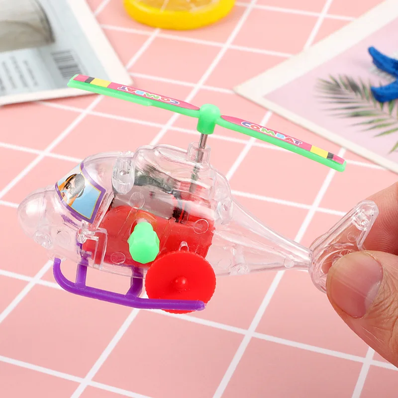 3Pcs/bag New Mini Transparent Aircraft Toys Fun Wind-up Helicopter Taxiing With Propeller Can Be Turned Toys Children's Gifts