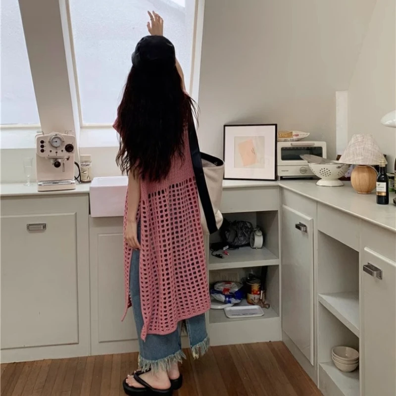 Vestido suéter feminino de malha em camadas cor sólida oco solto sem mangas colete vestido em torno do pescoço estilo viajante vestido 2025 novo