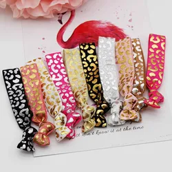 Großhandel 10 Stück Leoparden muster elastisches Haarband Pferdes chwanz halter Feind Haar gummis Stirnband Haarschmuck Armband Armband