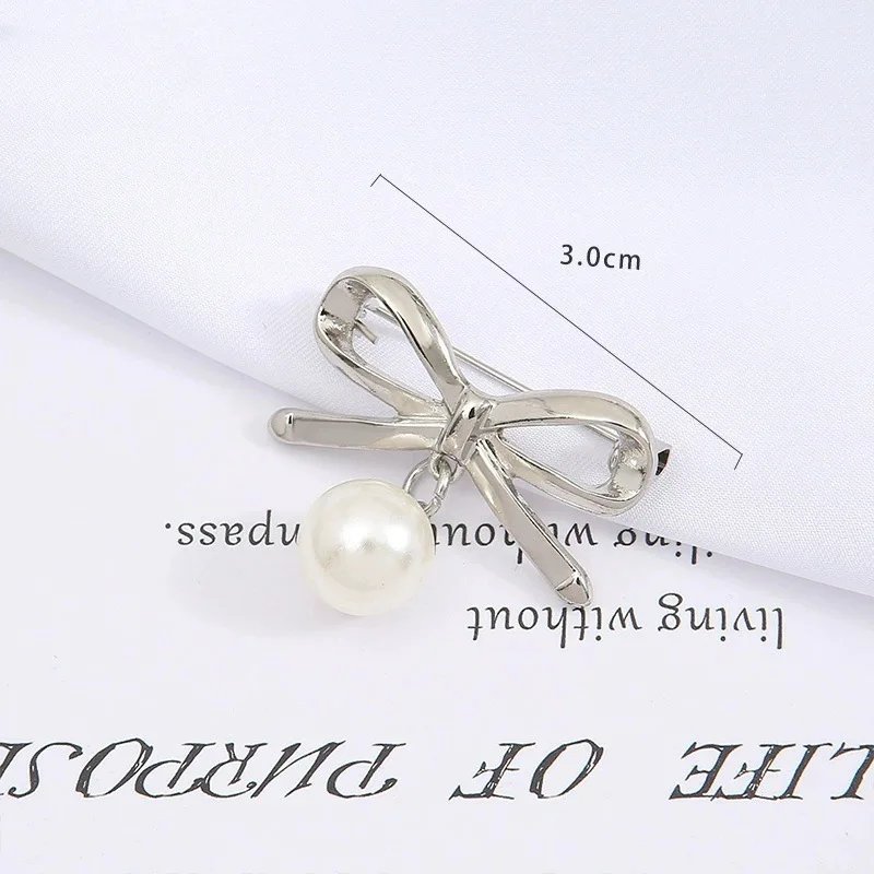 

Модная брошь-булавка с бантом и камнем «кошачий глаз» для женщин, универсальная и милая, предотвращает расстеливание лацканов, фиксирует модные воротники.