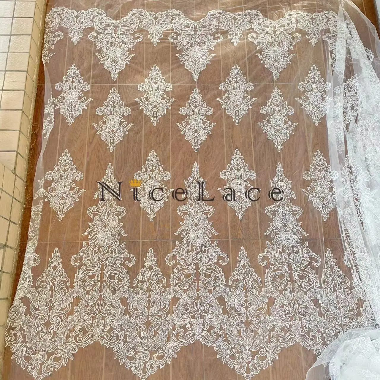 Nicelace 2022 Hot Sell Ivory Bride Embroidery Lace Fabric With Beads And Sequins Soft Tulle For Wedding Gown Bridal Dresses