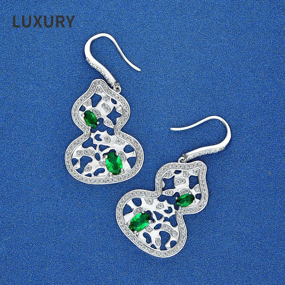 

Luxury S925 Sterling Silver 4*6mm Retro Hollow Design High Carbon Diamond Earrings For Women Sparkling Wedding Party