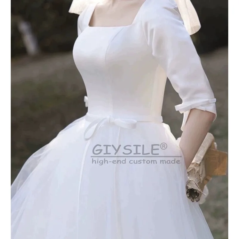 ชุดแต่งงานสีขาวแบบสั่งตัดของ GIYSILE ปี 2026 คอเหลี่ยมสไตล์เฮปเบิร์น สายรัดหลังแบบแฟชั่น กระโปรงฟูฟ่องแบบเจ้าหญิง