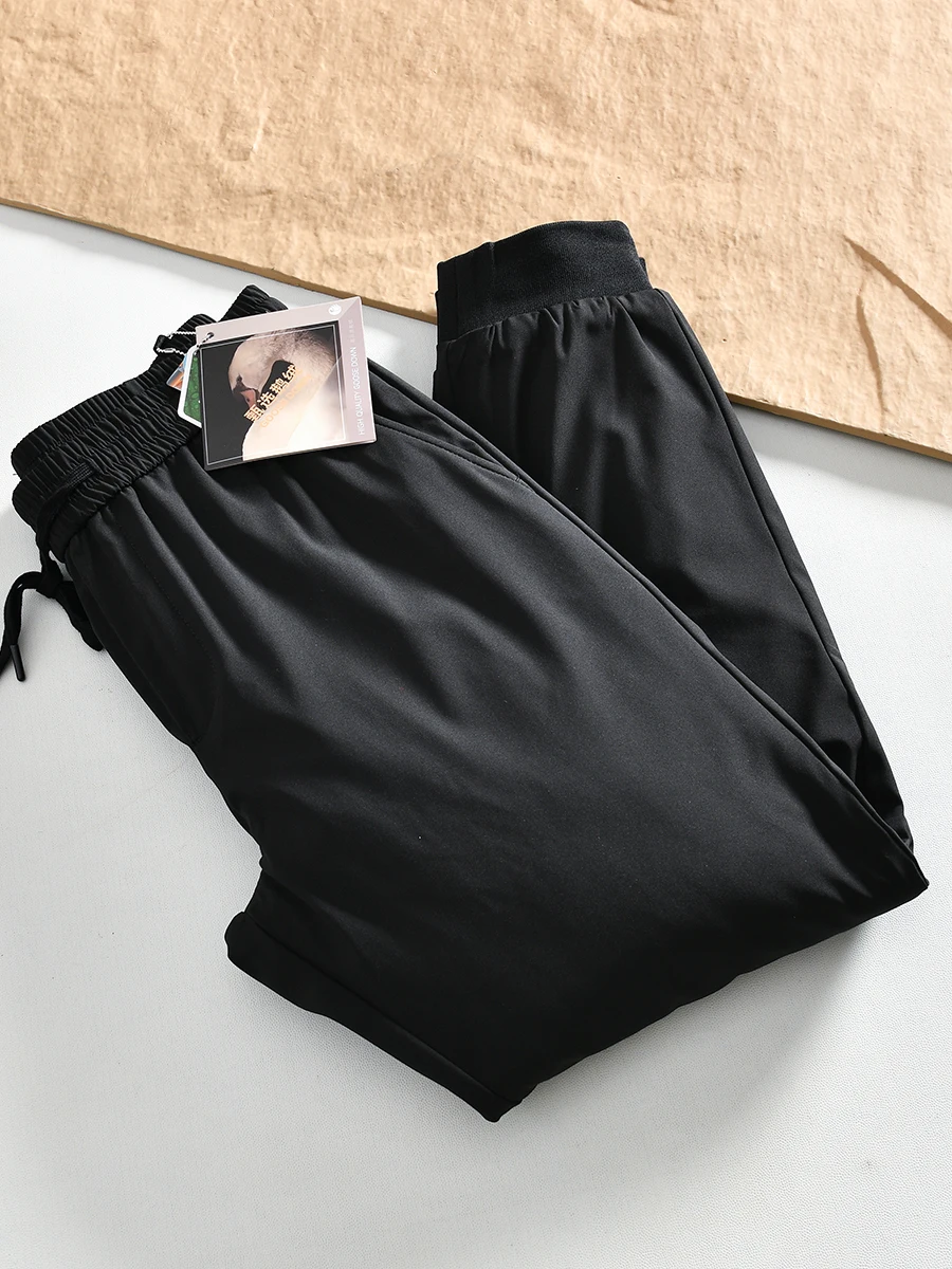 High-End Goose down Series Men's Outdoor Winter Tech Trousers Elastic Waist Warmth Three-Proof Straight Leg Casual Pants