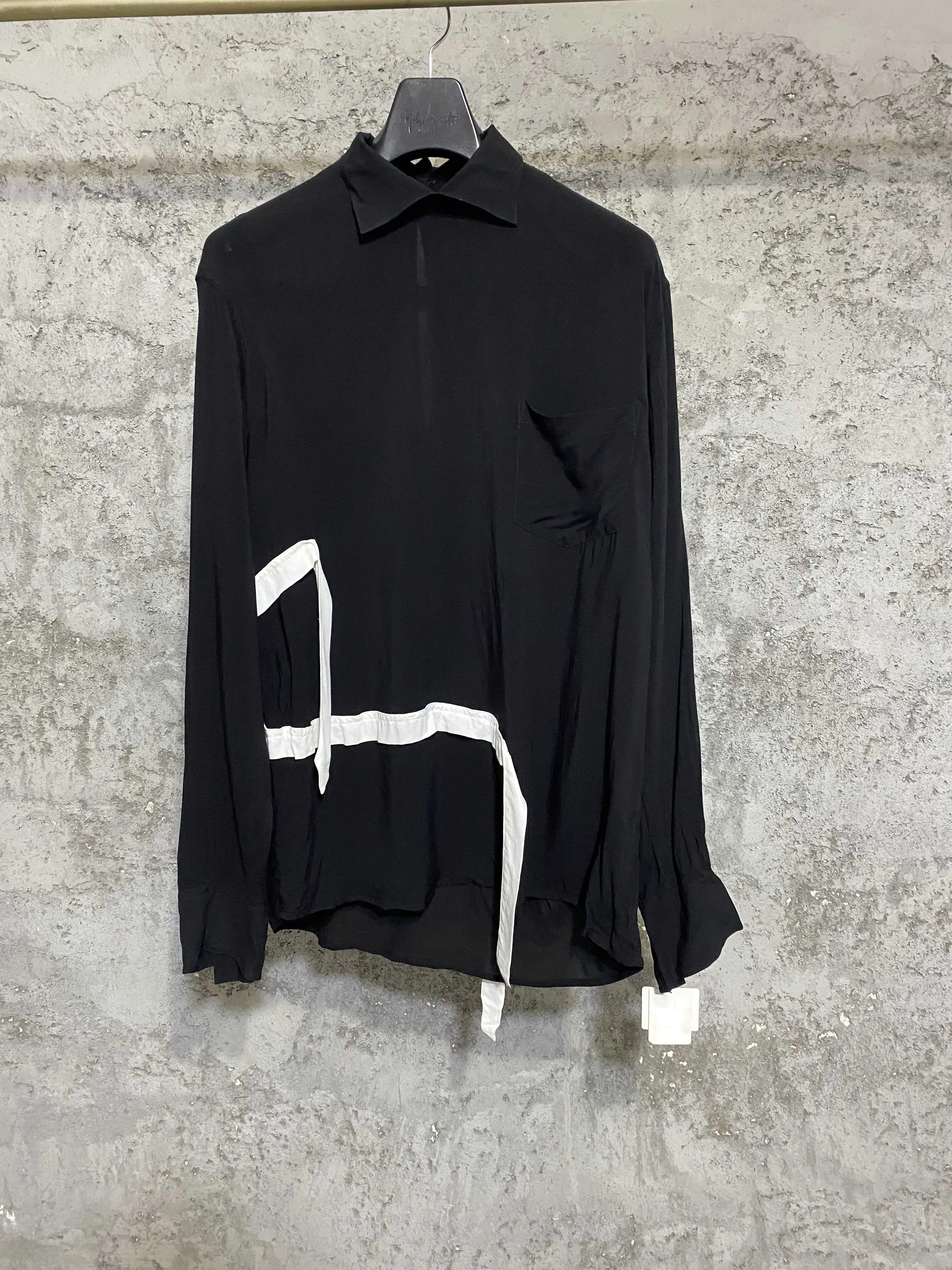This Japanese top-quality fabric belt shirt features a slit ribbon on the back