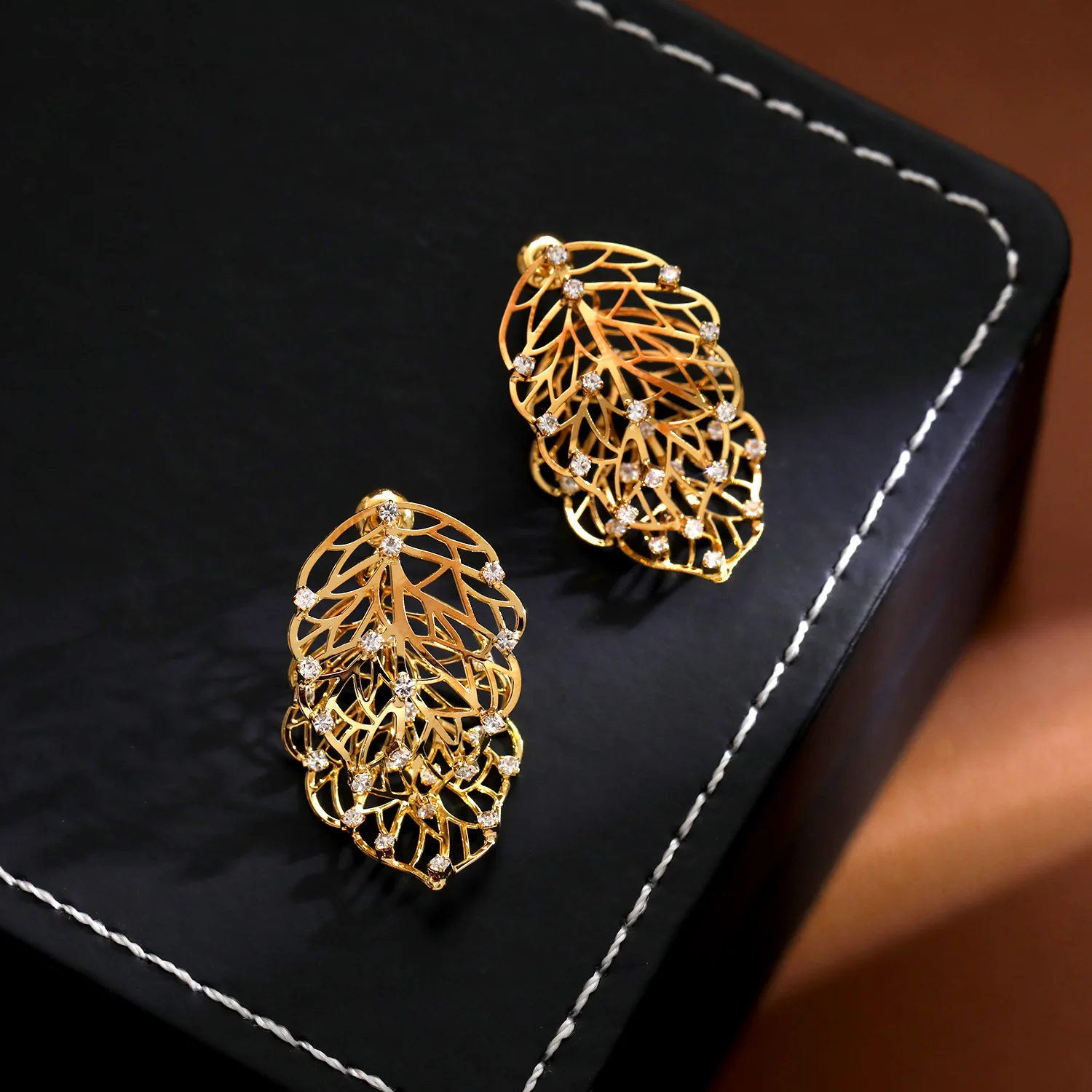 High Quality Double Sided Wear Hollow Leaf Earrings Fashion Commute Light Luxury Niche Double Leaf Zircon Ear Studs Wholesale