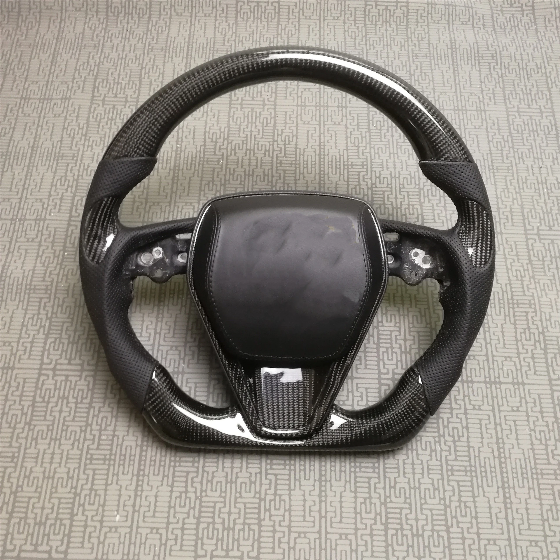 The eighth generation Camry carbon fiber steering wheel is suitable for Toyota Corolla Relin Asia Dragon steering wheel modifica