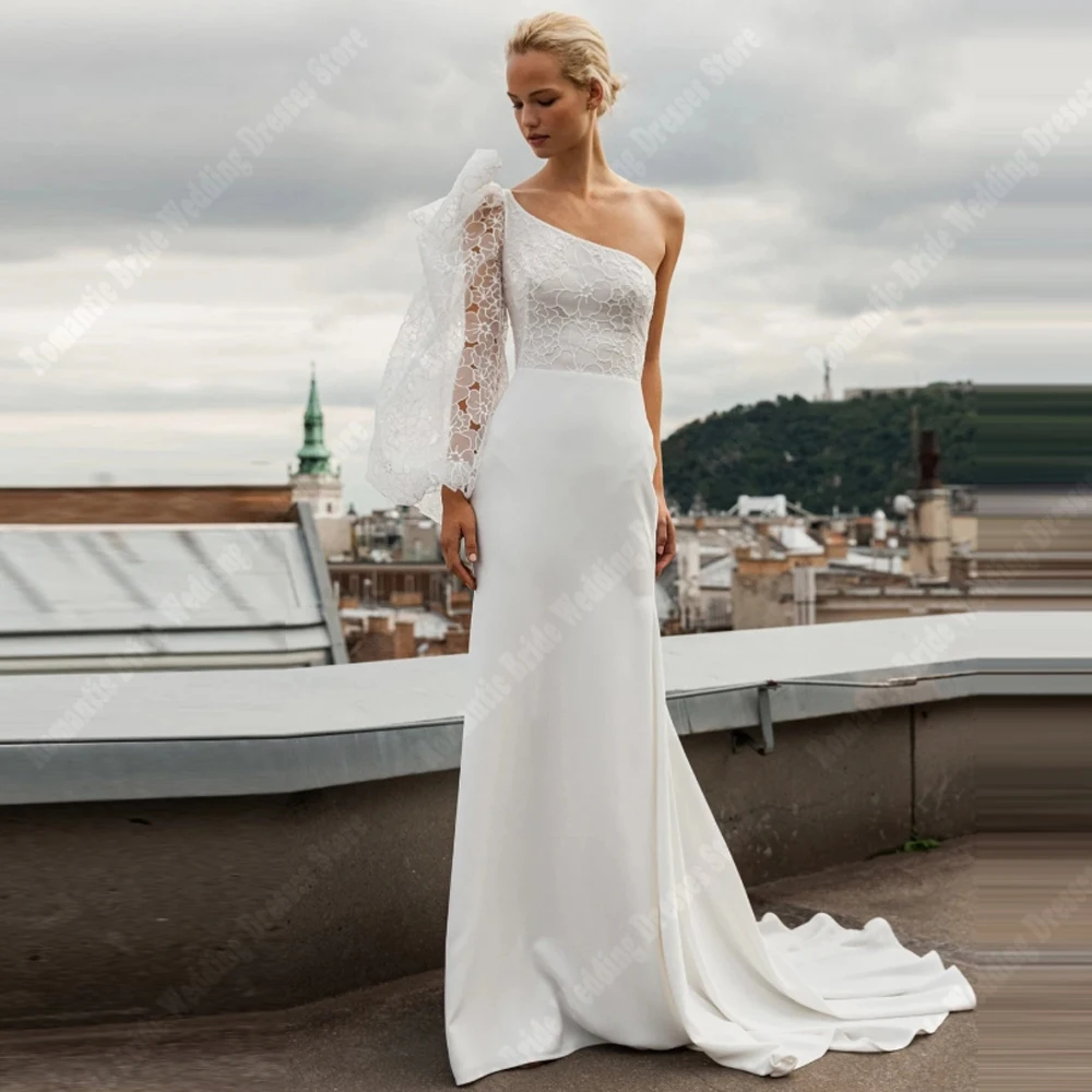 ชุดแต่งงานผู้หญิงแบบไหล่เดียวสุดเซ็กซี่ปี 2025 ชุดเจ้าสาวทรงเมอร์เมดหรูหรา ยาวลากพื้น สไตล์เจ้าหญิง  สามารถสั่งตัดได้