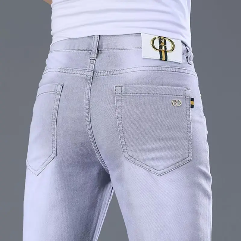 

Hong Kong Trendy Brand Light Grey Elastic Denim Jeans Men's Slim Fit Casual Pants 2026 New Style Versatile Comfortable Breath...