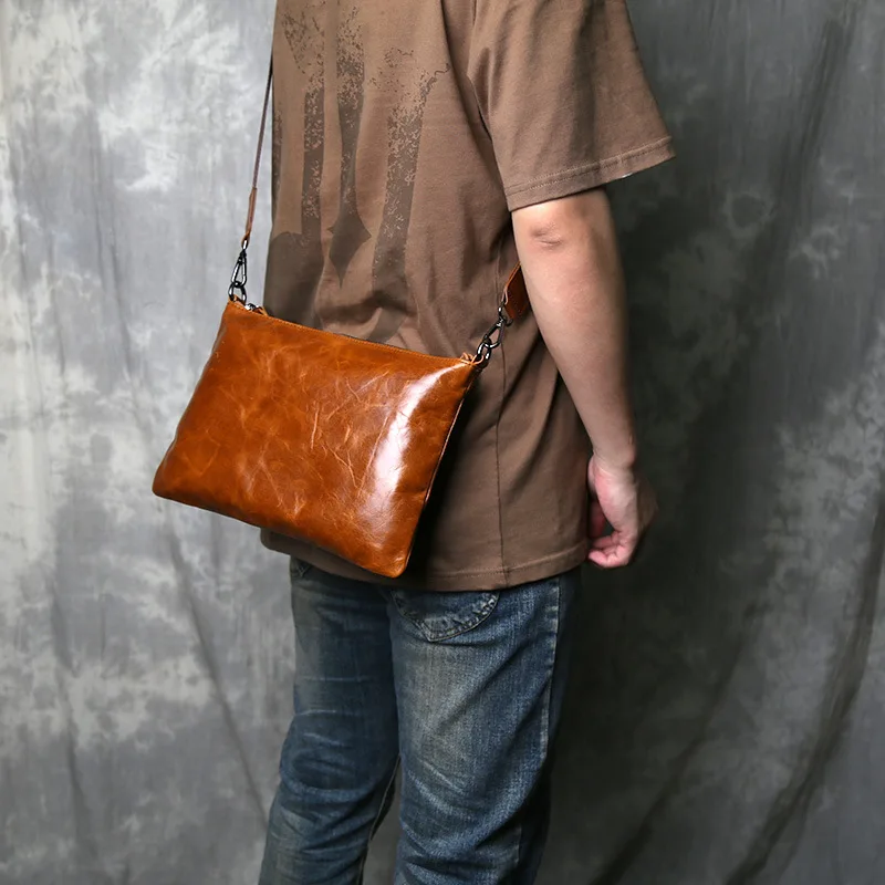 حقيبة كروس كلاسيكية من الجلد المشمع والحبوب العلوية 2025 تصميم جديد بسيط للجنسين محفظة بمقبض ذات سعة كبيرة #4