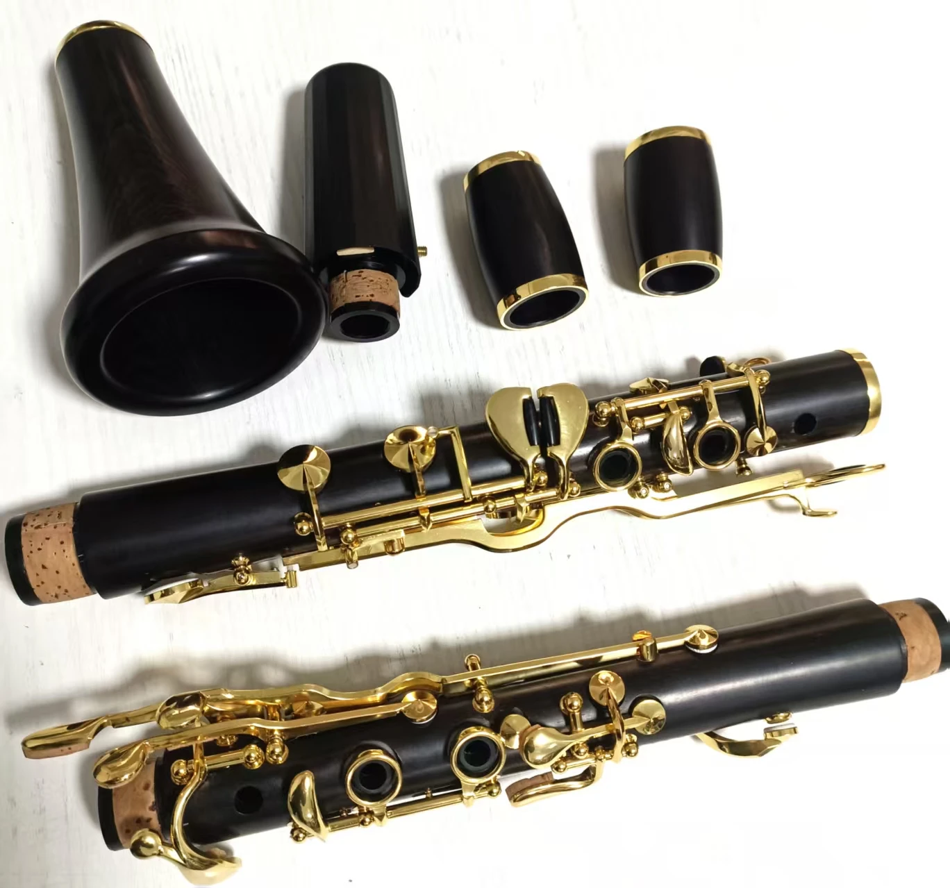 A Tone Clarinet German System Ebony Body Gold Plated 18 Keys Woodwind Instrument For Orchestral Musicians Stage Recital