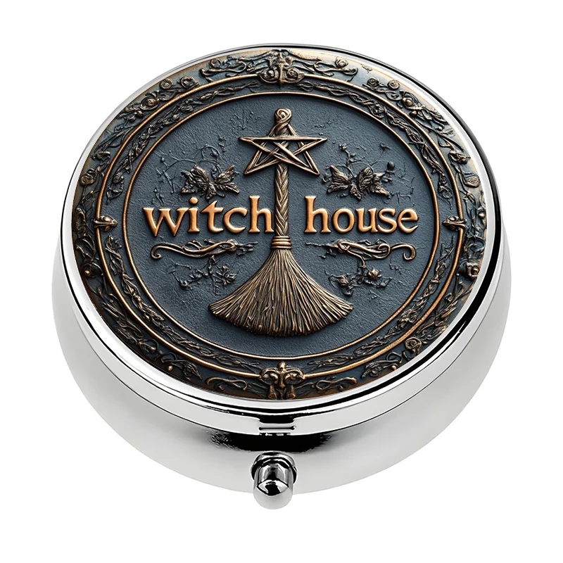 A travel-friendly pill box with a witch house design, featuring three compartments, perfect for storing vitamins and medication. This compact pill box is a unique gift for travel and everyday use. Suitable for Halloween.