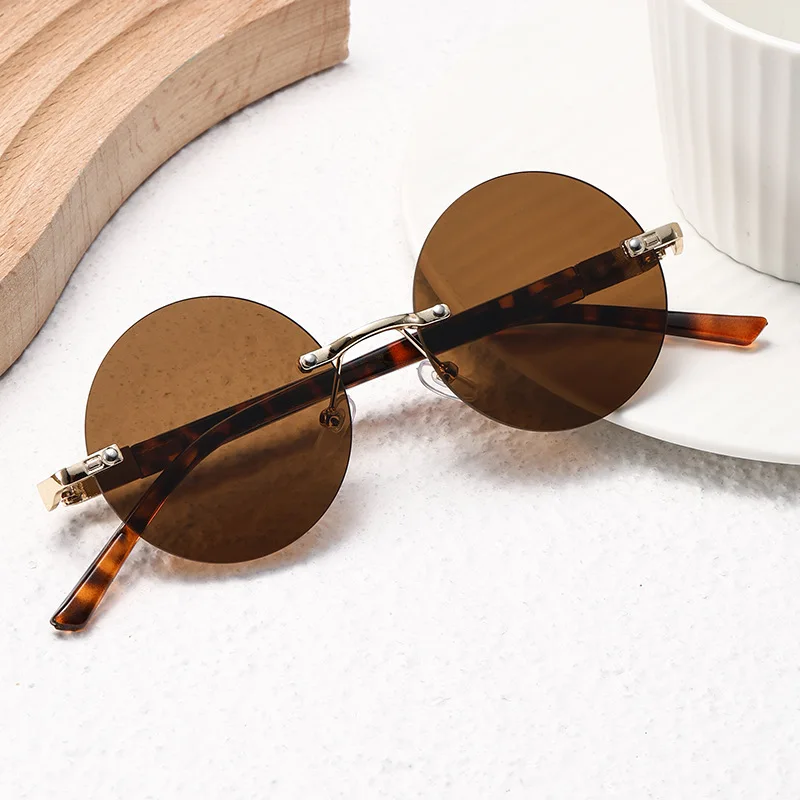 

Classic Retro Rimless Round Sunglasses Tortoiseshell Temple UV400 Shades Fashion Metal Frame Circular Eyewear for Men and Women