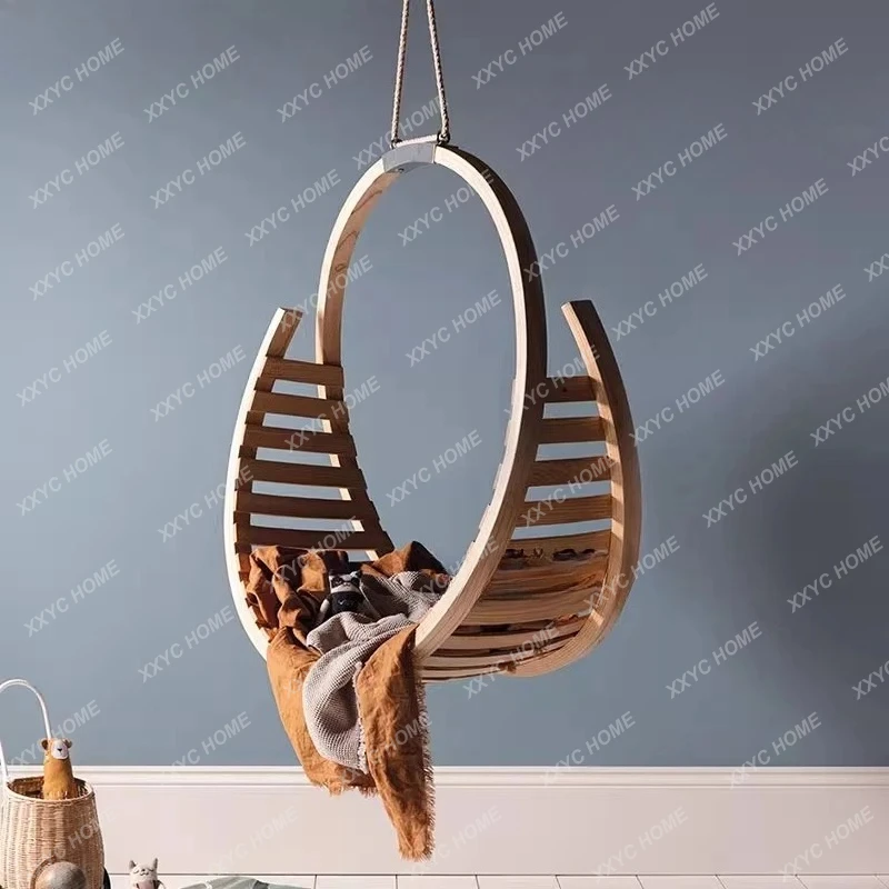 A Modern simple solid wood hanging chair Home villa Art swing Creative hanging basket Swing chair