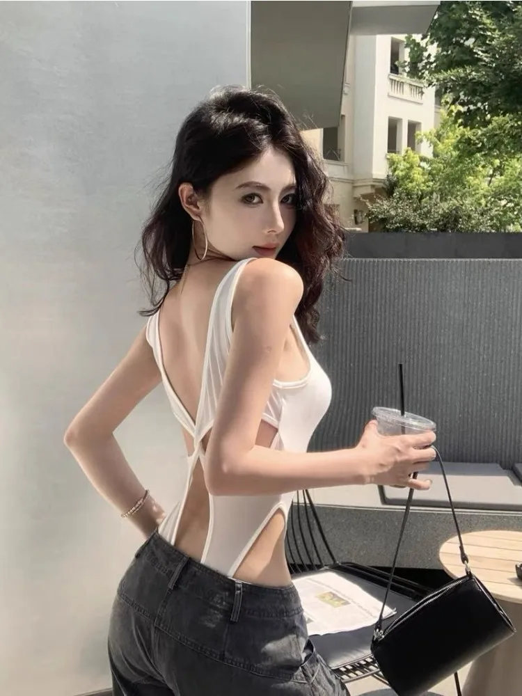 2026 Summer Fashion New Women's Elegant Design Sense Spicy Girl Suspender Jumpsuit Backless Hollow Irregular Jumpsuit