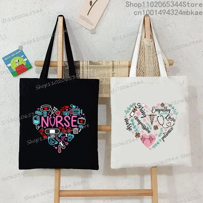 Equipo médico bolso de hombro con forma de corazón para mujeres y hombres, bolso de mano con patrón de latido del corazón y letras de enfermera,