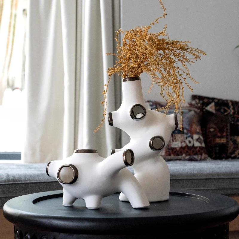 

Modern abstract porous shaped ceramic ornaments living room bedroom dining table art vase decoration creative home decoration
