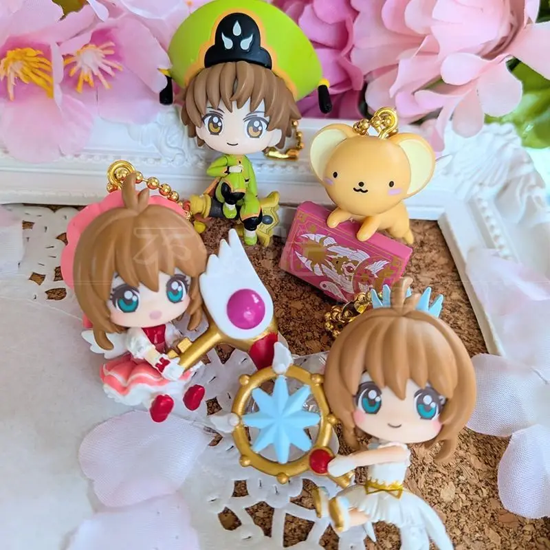 

Новые оригинальные карты Captor Sakura, капсульные игрушки, 4 стиля, аниме-фигурка, кукла, кулон, поворотное яйцо, орнамент, игрушки, окружающий подарок