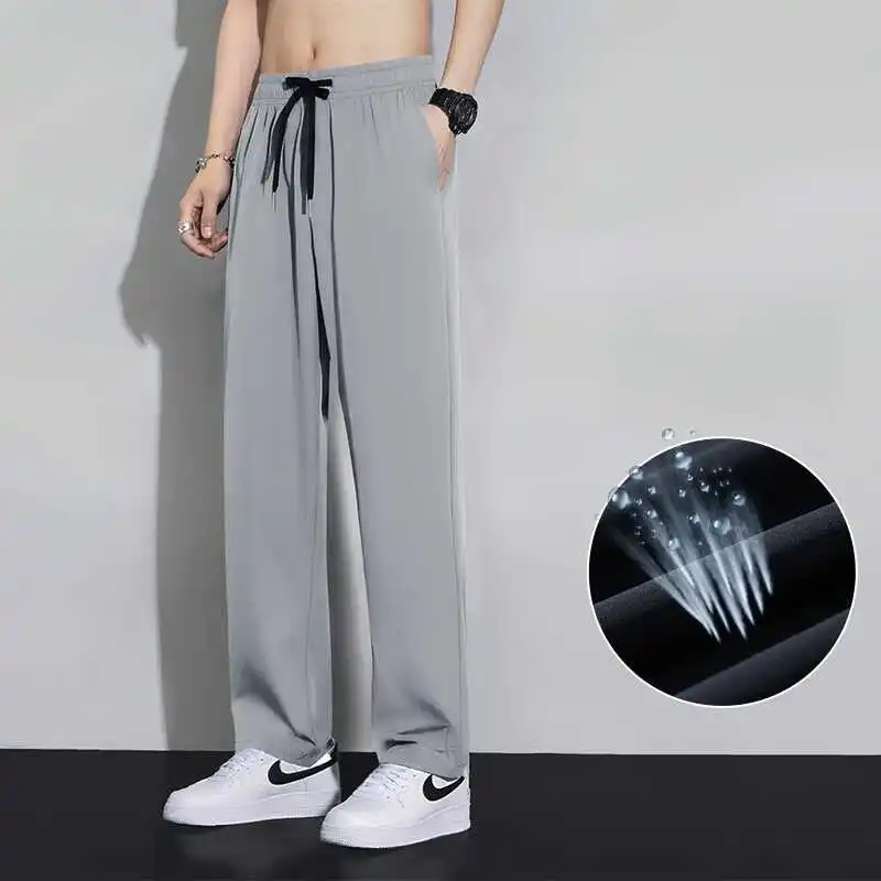 Pantaloni casual estivi in seta di ghiaccio sottile Pantaloni larghi da uomo resistenti all'usura Pantaloni lunghi a gamba dritta per giovani