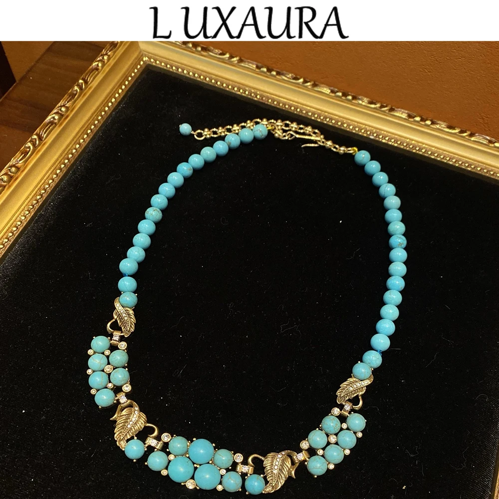 

Vintage fashion classic copper plated 18K blue natural turquoise leaf design versi paired with bohemian women's jewelry necklace
