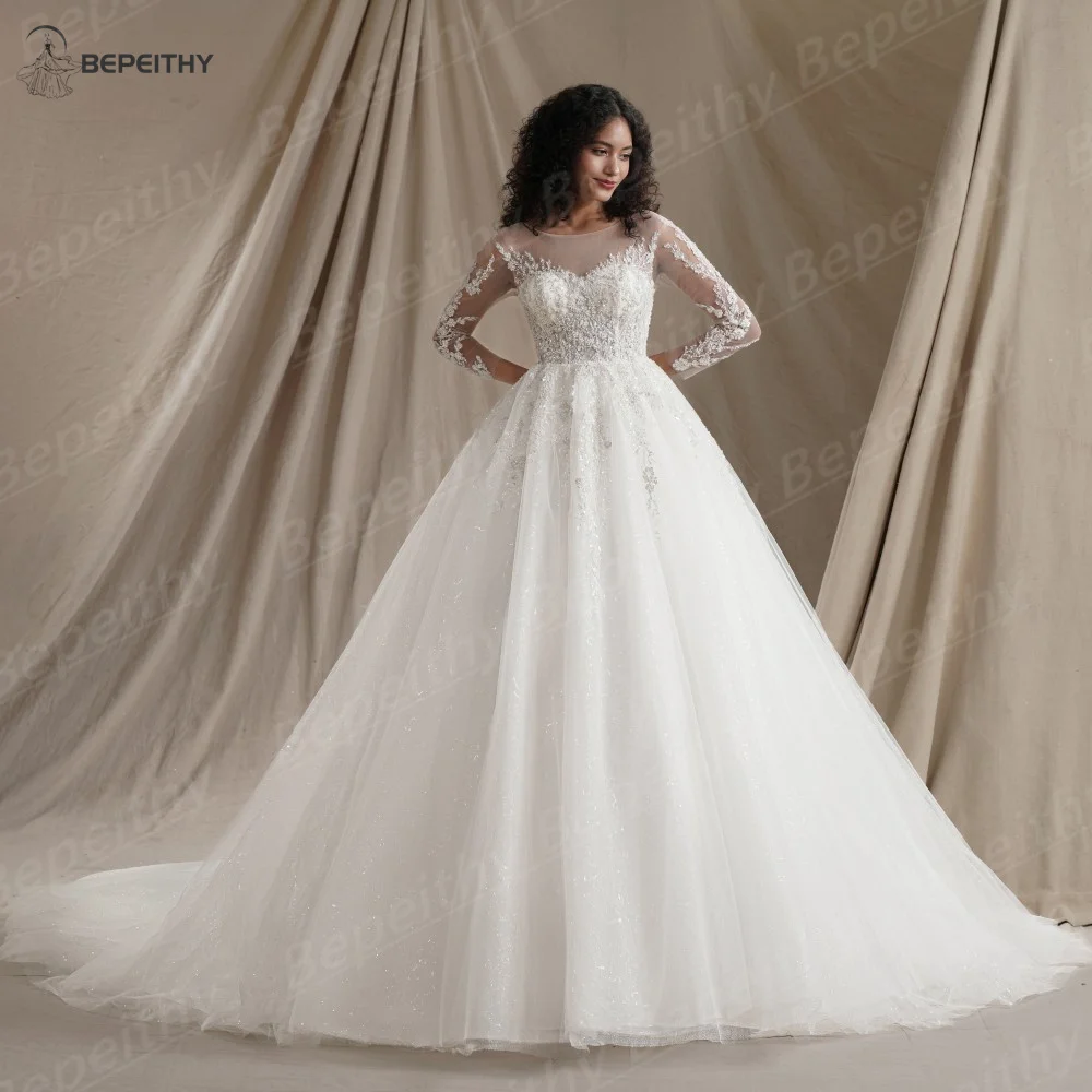 BEPEITHY Abiti da sposa musulmani personalizzati a maniche lunghe 2024 Donne invernali Principessa da sposa Avorio Lusso Glitter Ball Gown Sposa