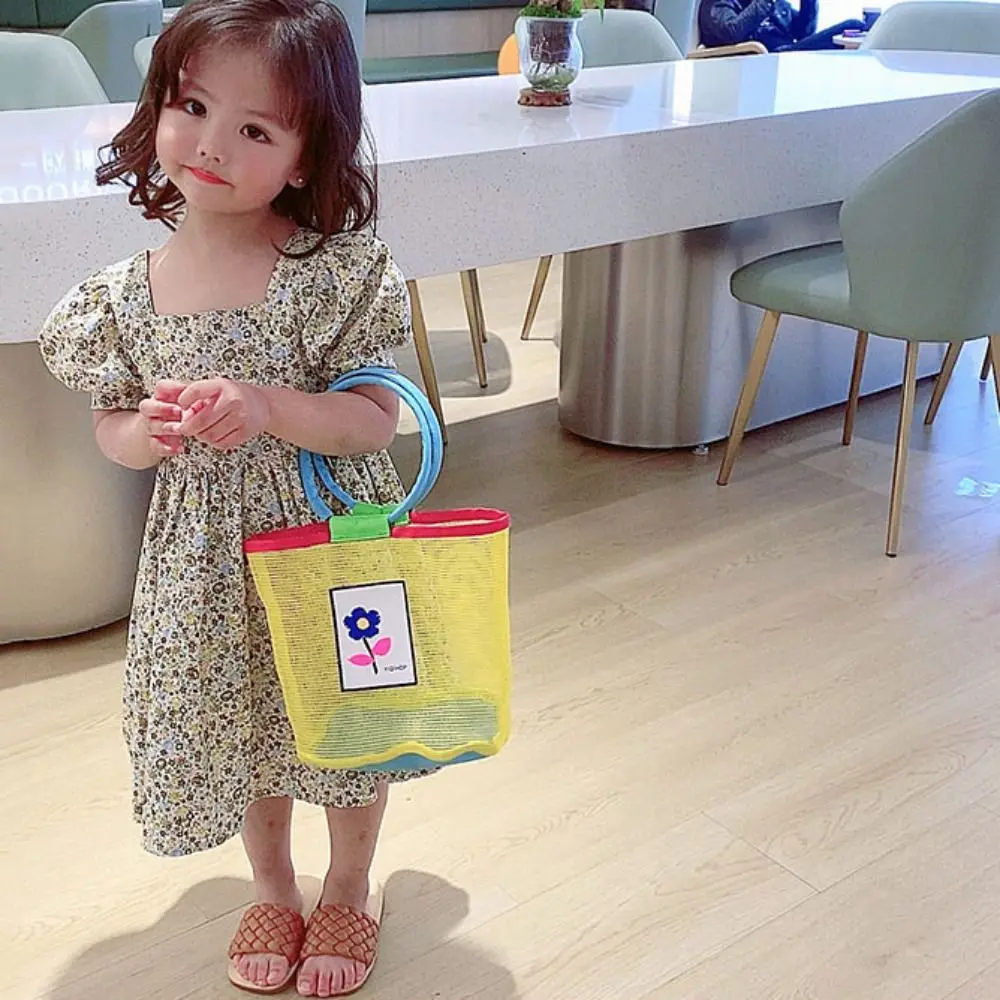 اللون الاصطدام شبكة حمل حقيبة شفافة قذيفة حقيبة التخزين الأطفال حقيبة يد الجوف خارج الأم الاطفال حقيبة شبكة حقيبة شاطئية السفر