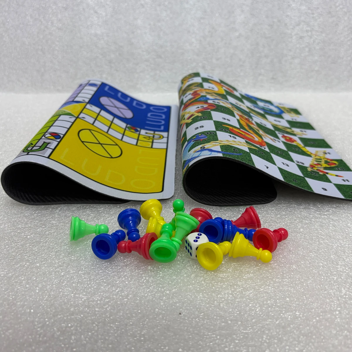 2-in-1 Set Includes Both Ludo and Snakes and Ladders Complete with 24cm Standalone Rubber Game Board 16Pcs Plastic Pieces 2 Dice