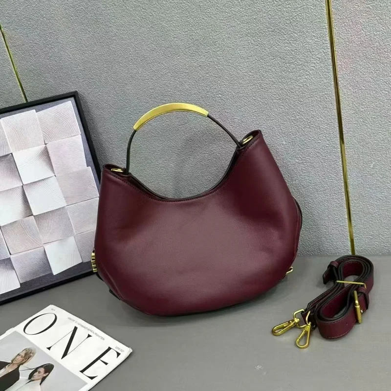 

Новая женская сумка-полумесяц 2026 года от известного бренда, французский нишевый дизайн, на молнии, с ручкой и плечевым ремнем, в форме седла