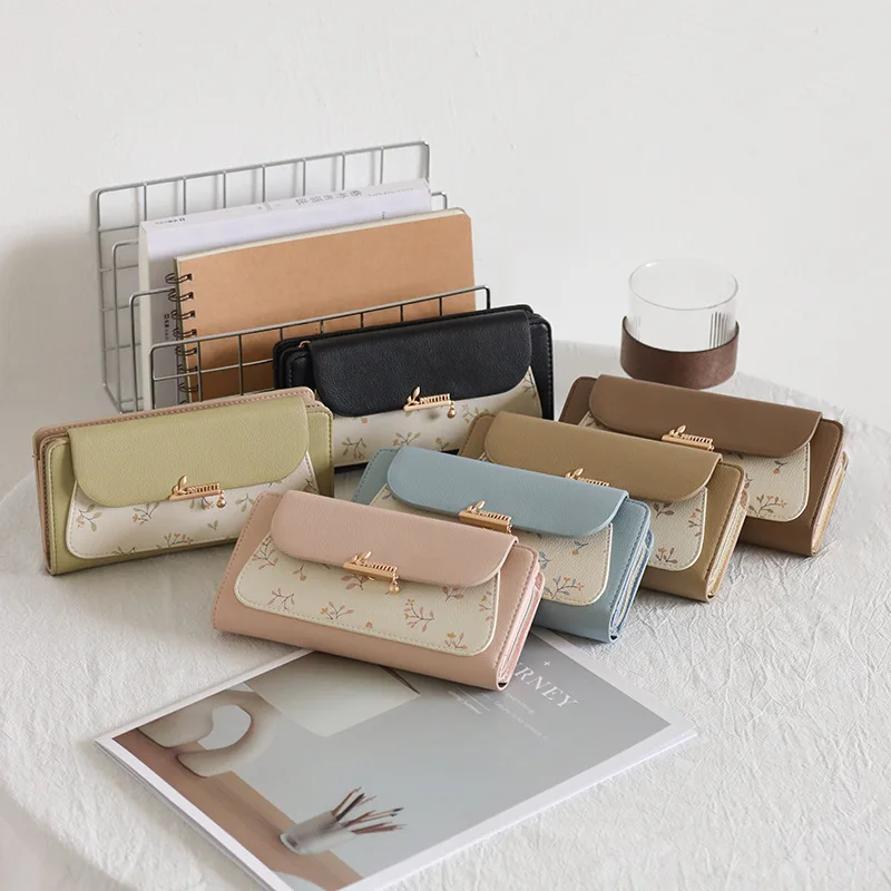 

Ladies long cute purse PU leather print clicked three fold large capacity color collision travel handbag