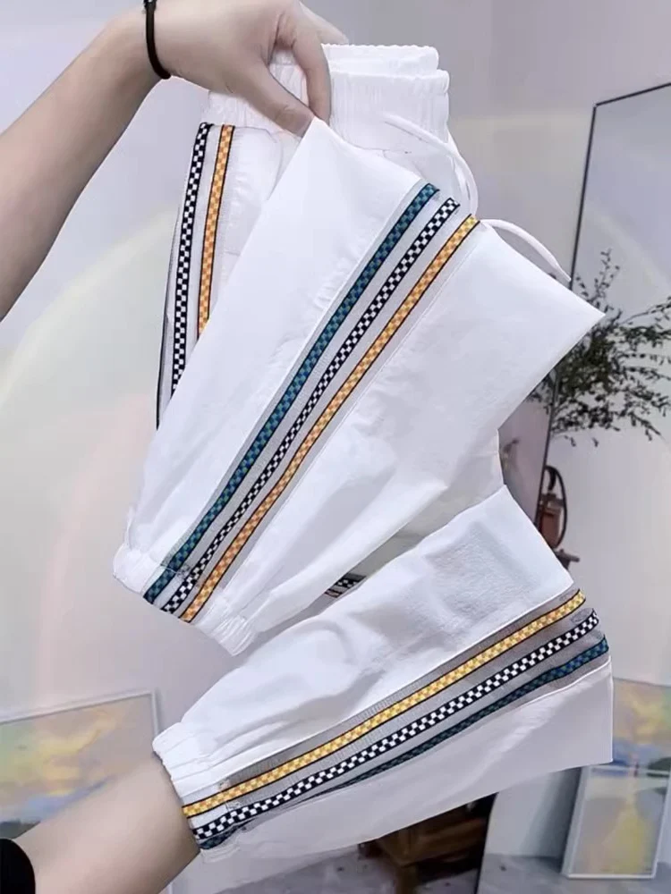 

Ice Silk Qui Dry Sports Pants Women Summer Thin Loose Cuffed Small Size Nine Points Casual Harlan Pants Asymmetrical Commut...