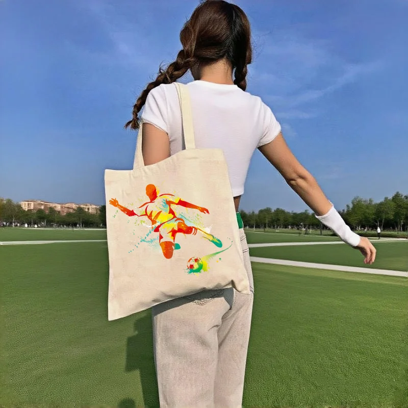 

1pc Colorful Soccer Player Print Canvas Tote Bag Double Sided Shoulder Bag Sports Fan Eco Shopping Handbag