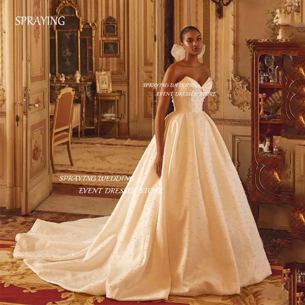 رش فساتين الزفاف الفاخرة اللؤلؤ الحبيب سويب تراين زي العرائس الساتان ألف خط طويل فيستدو دي كاسامنتو. #1