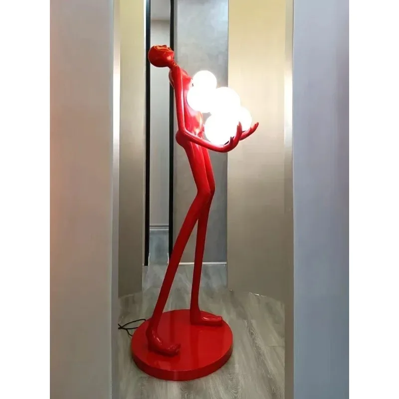 

statue sculpture floor lamp, long arm holding ball, creative design exhibition hall, hotel sales office ornament
