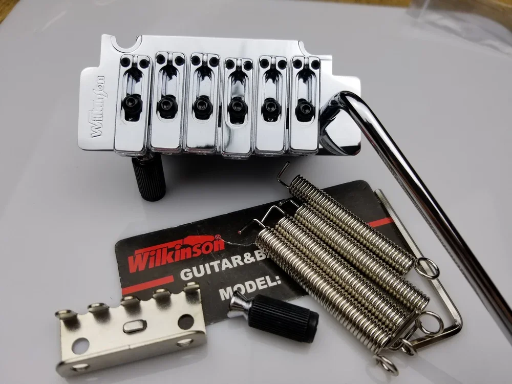 

Wilkinson WVS50K Electric Guitar Tremolo System Bridge With matching Satin Saddles Chrome Silver Gold