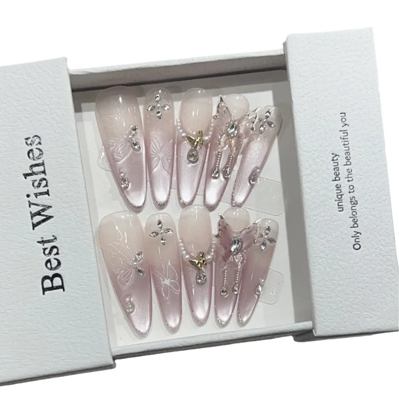 

[Zhuang Zhou Mengdie] Thin dog wears long handmade fake nails, pink cat's eye French broken diamond butterfly manicure
