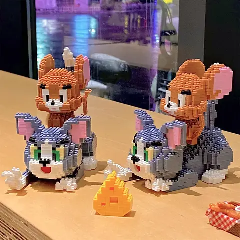 Funny Tom And Jerry Micro Building Blocks Cheese Cat and Mouse Assembly 3D Model Anime Mini Brick Figure Toy For Christmas Gift