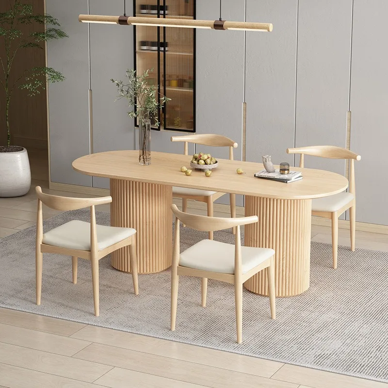 Nordic solid wood oval dining table, creative natural wood color multi-person dining table, small apartment