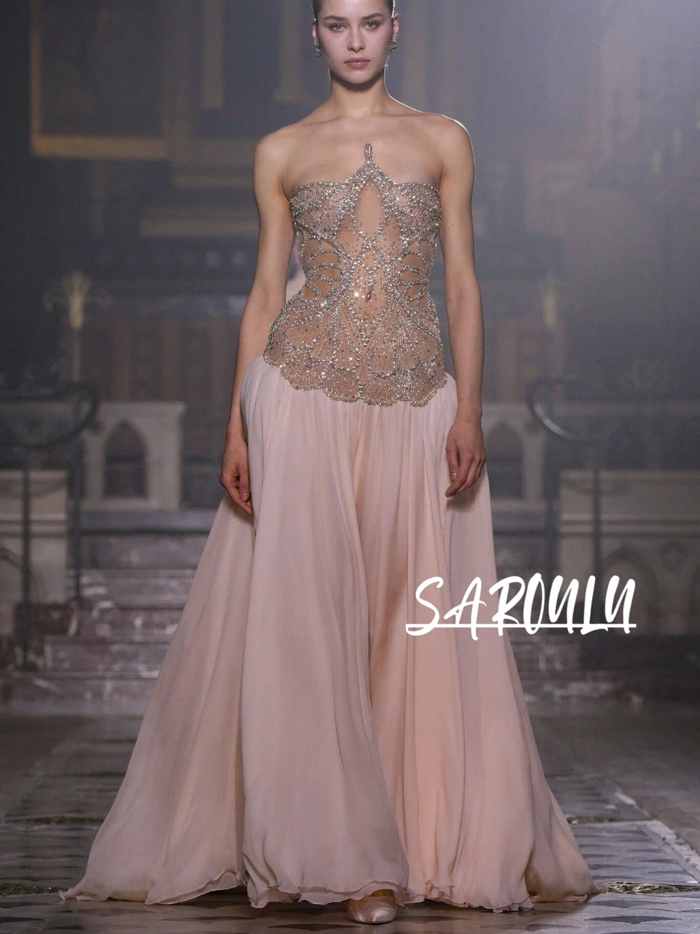 

Blush Pink Strapless Prom Gown Sheer Crystal Embellished Corset Bodice Elegant Flowy Floor-Length Formal Evening Dress For Gala