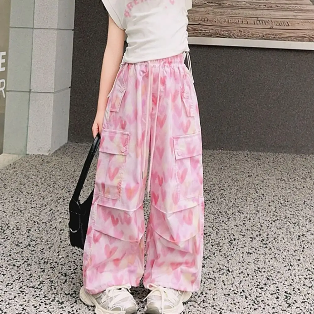 جيوب متعددة السراويل البضائع الفضفاضة الرباط ركض Y2k بنطال ذو قصة أرجل واسعة الهيب هوب عالية الخصر القلب الطباعة السراويل فتاة الرياضة