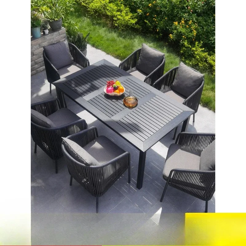 

Internet celebrity villa outdoor tables and chairs courtyard outdoor plastic wood outdoor rattan chair combination Teng
