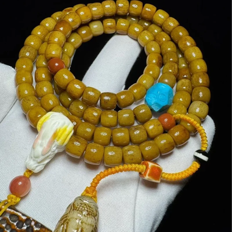 Natural aged camel bone multi-loop bracelet with a Liuchao Yuansheng brand charm, suitable for gifting, personal use, and collec