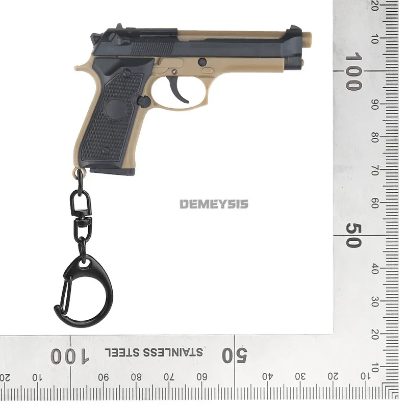 Mini Pistol Shape Keychain 1911 / M92 Model Plastic Key Ring Detachable Tactical Gun Model Keychain Backpack Decorations Gifts