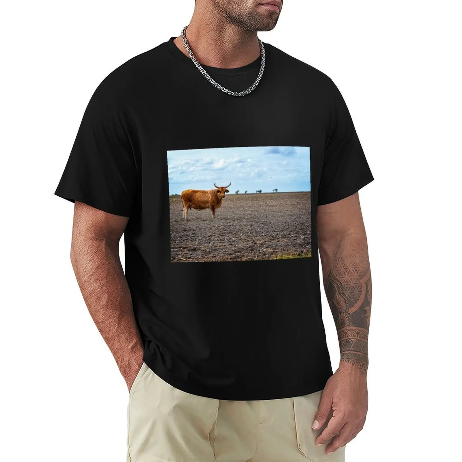 Cow with horns standing in empty pasture T-Shirt Lightweight Sport Basic T-Shirt