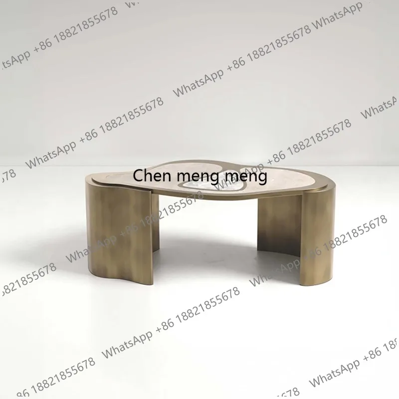 

Итальянский дизайнерский кофейный столик из нержавеющей стали в стиле лайт-люкс, нестандартной формы, высококачественный, необычный.