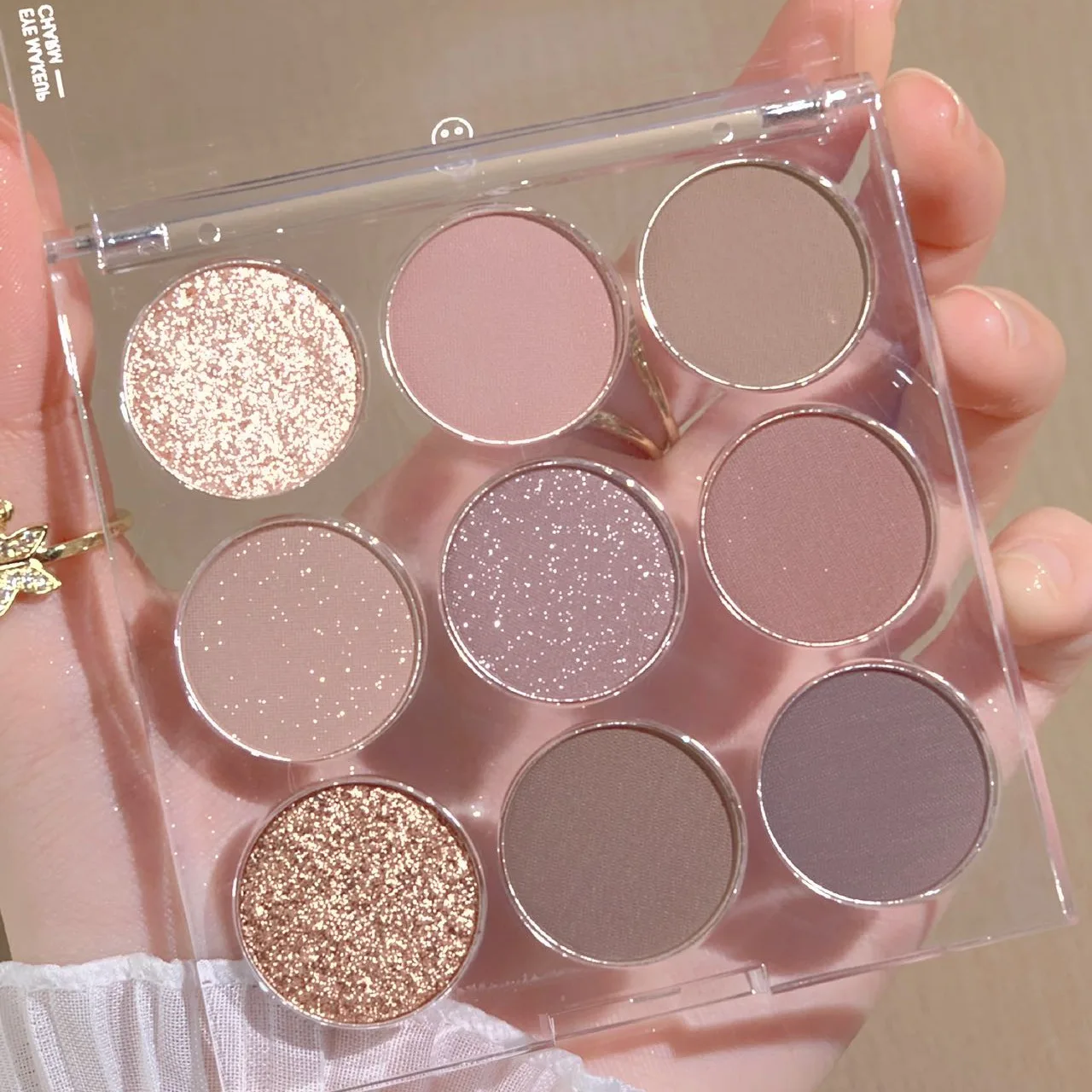 xixi transparent relief nine-color eye shadow tray milk tea earth tone pearlescent matte glitter sequins