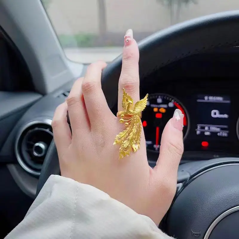 

Women's 24K Gold Traditional Phoenix Ring, AU999 | Engraved "Mystery" with hidden star-trail motifs.
